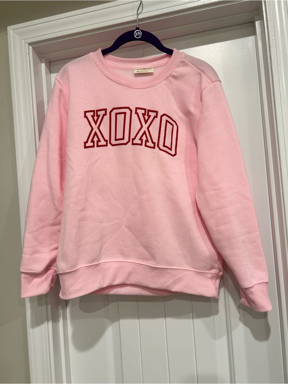 XOXO Light Pink Crewneck Sweatshirt with Red Lettering